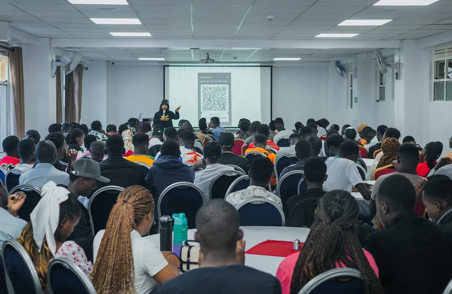 A full hall of learners at an Amplify Africa training session